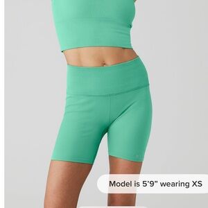 Alo bike shorts in color lettuce